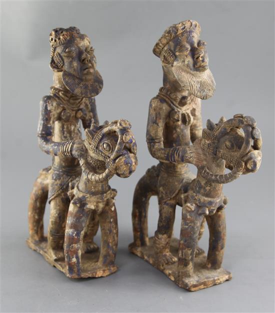 A pair of Jenne Inner Niger Delta, Mali terracotta horses with riders, decorated with blue paint, 43cm